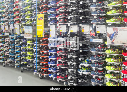 Kalenji branded running shoes in Decathlon store. 'Kalenji' is Decathlon`s own running (shoes and clothing) brand. Stock Photo